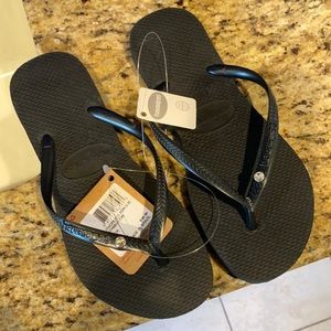 Never worn - size 7/8 havianas- fits like a 7 -